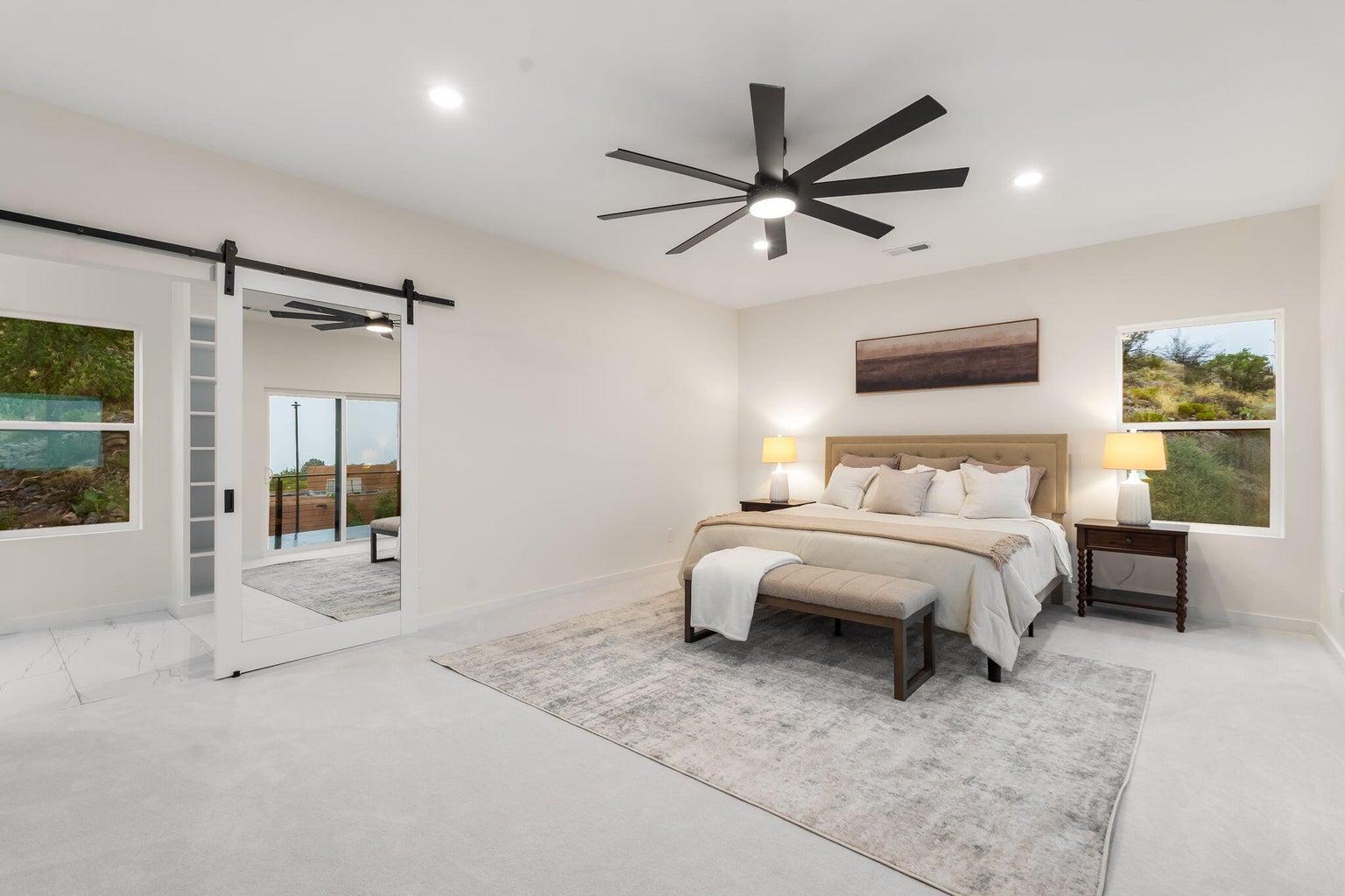 Modern primary suite at 1136 Turner Drive NE in Albuquerque, showing a bright bedroom with contemporary finishes.