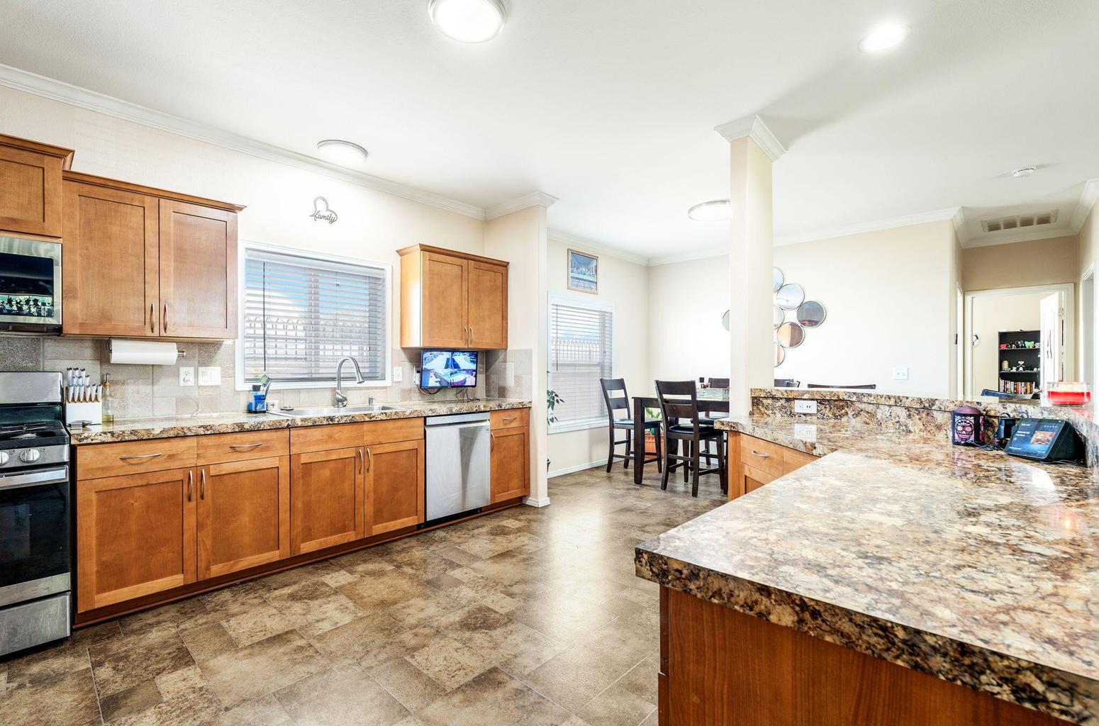 Kitchen in the main home at 4411 Carlton Street NW in Albuquerque, showing the main house kitchen area.