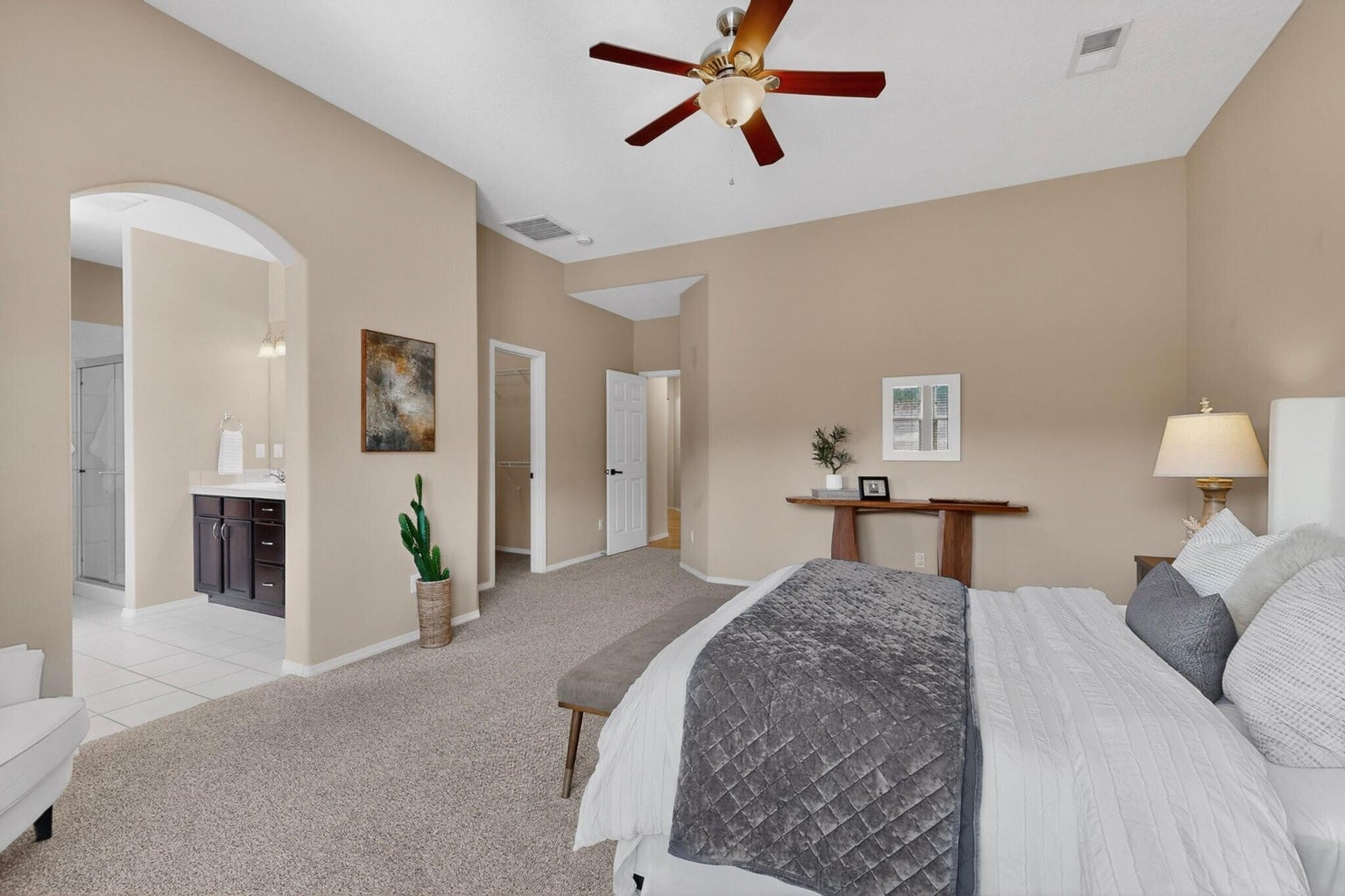 Primary suite at 2028 Vernon Drive SE in Albuquerque, showing bedroom space and the private retreat area of the single-story home.