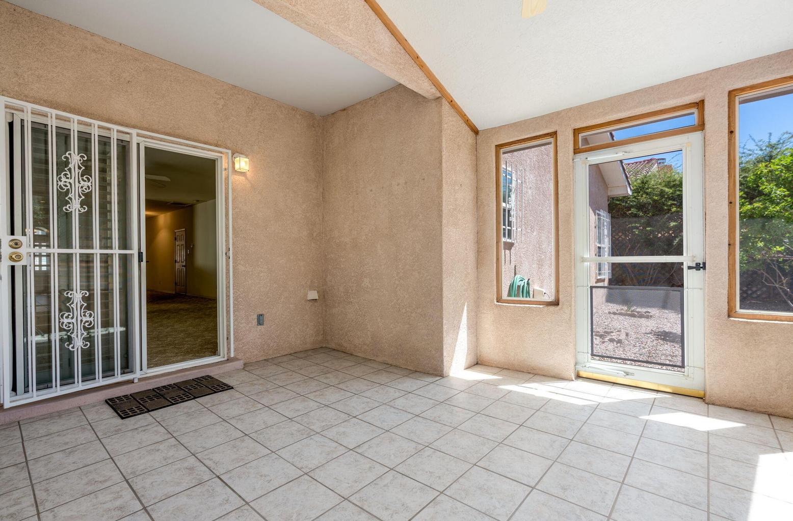 Sunroom at 6432 Monahiti Place NE in Albuquerque, showing flexible interior space for relaxing, work, or casual gathering.