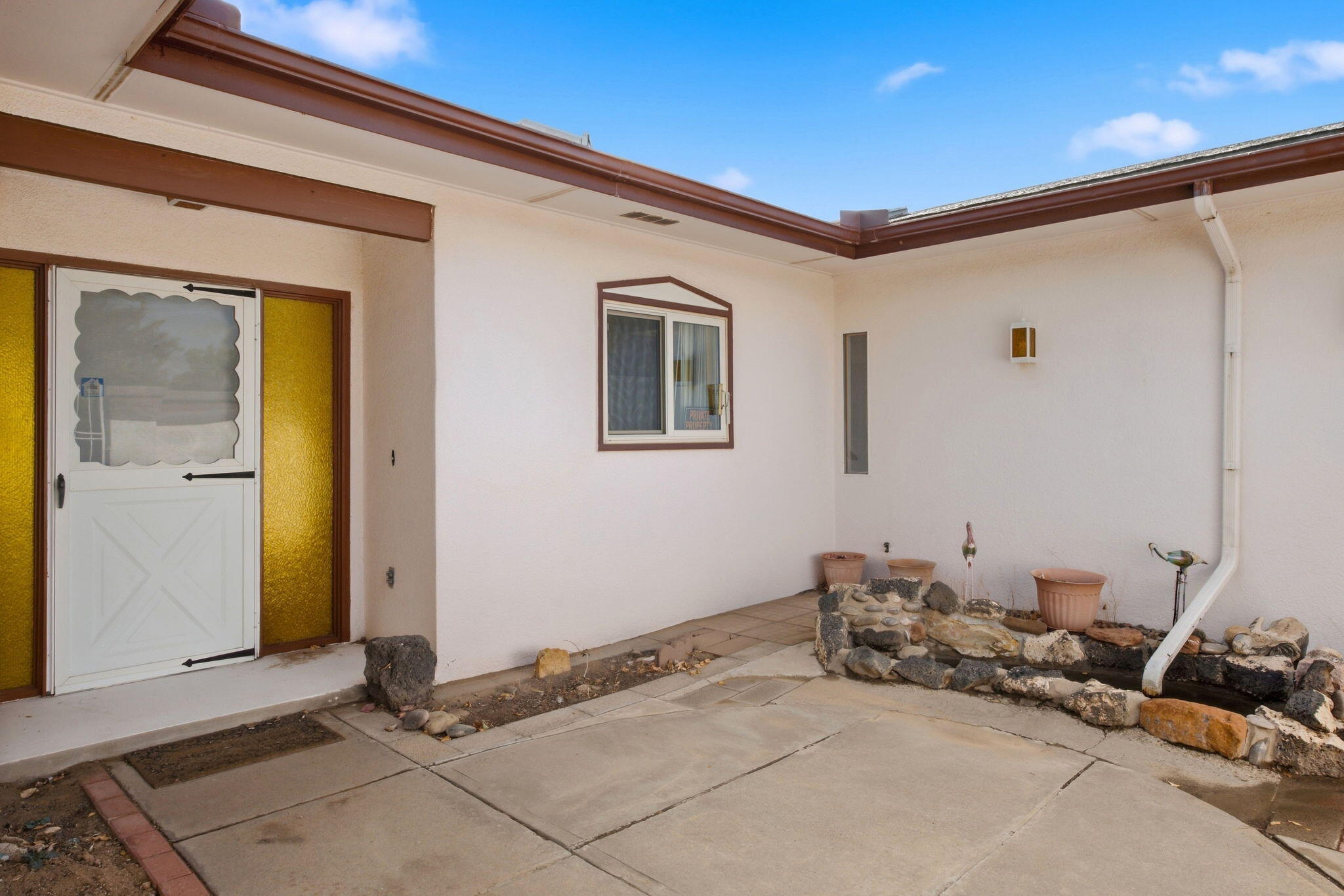 Enclosed front courtyard and entry at 4108 Leon Grande Avenue SE