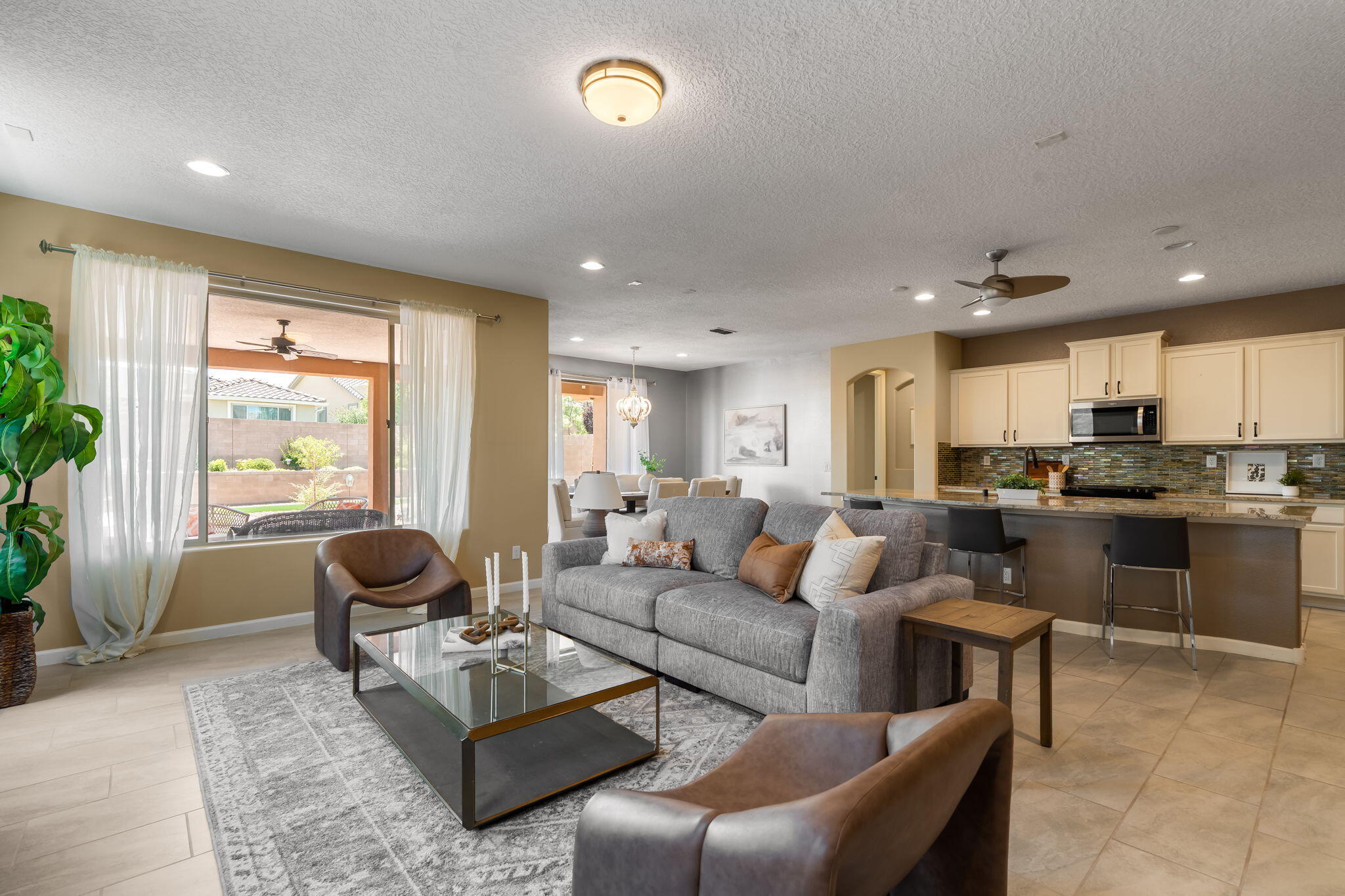 Open great room and kitchen at 9228 Sugar Creek Lane NW.