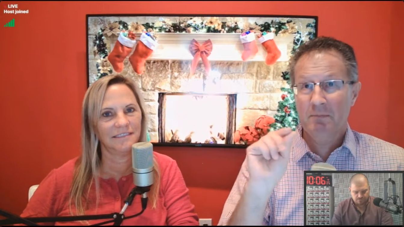 Tracy and Tego in front of a virtual Christmas fireplace with radio host Eddie Aragon visible in an inset.