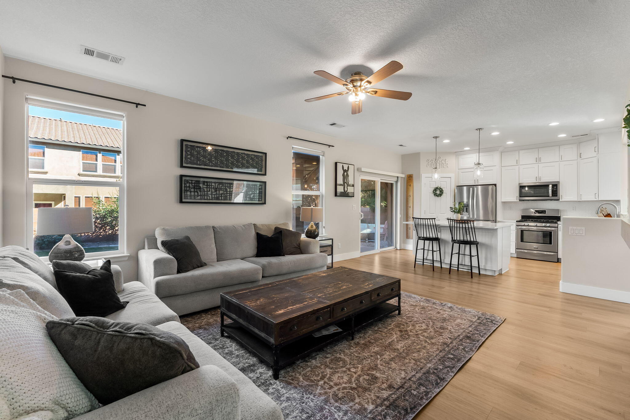 Living area facing the kitchen island at 22 Monte Vista Drive NE in Loma Colorado