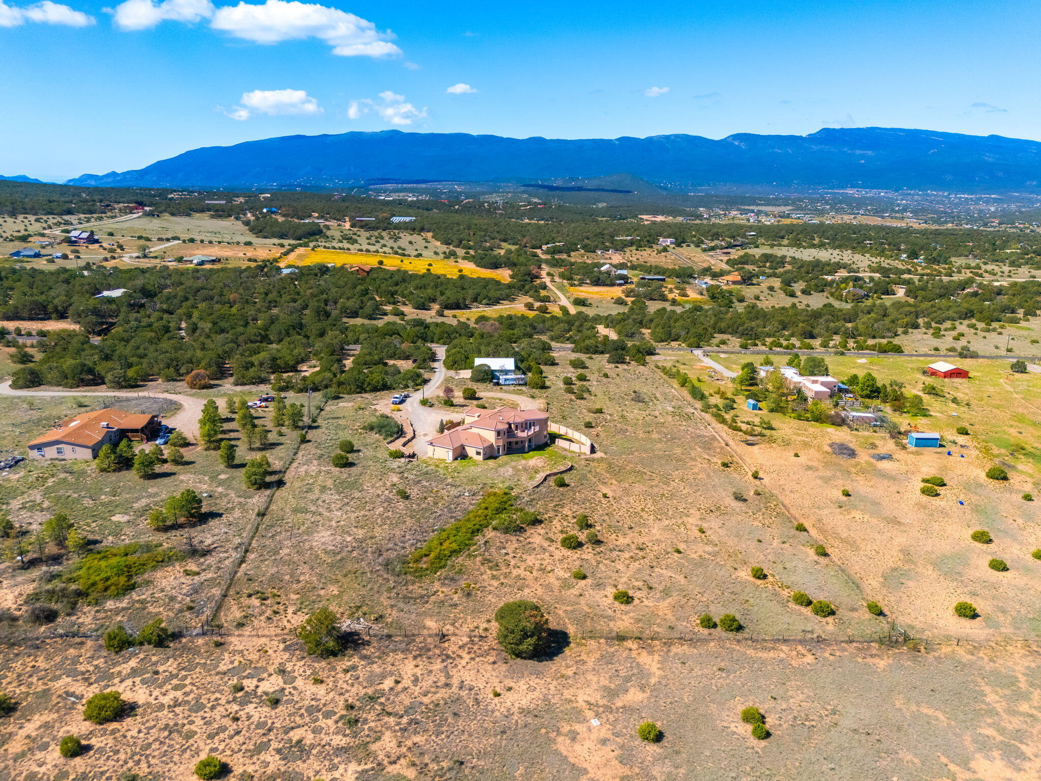 Aerial view of the acreage and surrounding East Mountain landscape at 31 Kramer Road